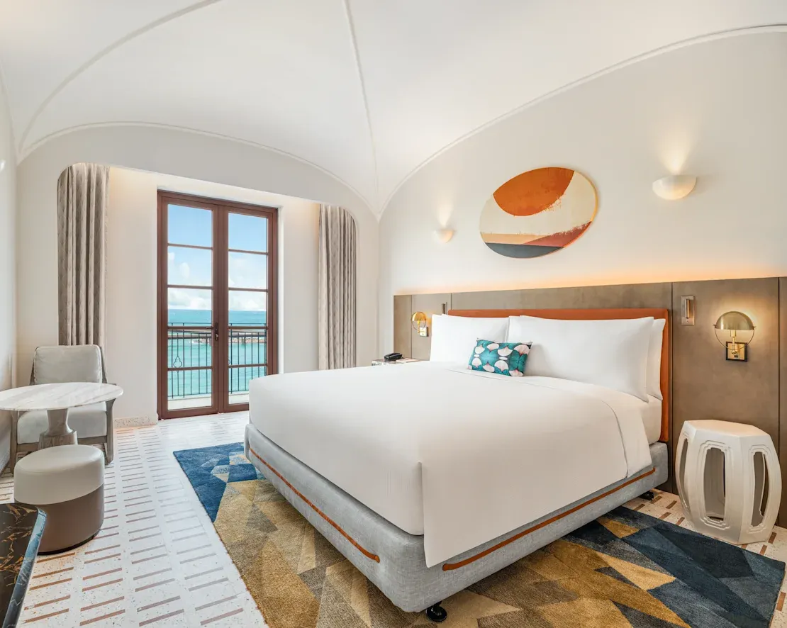 PQCPQ_King_Balcone_Ocean_View__Bedroom.webp